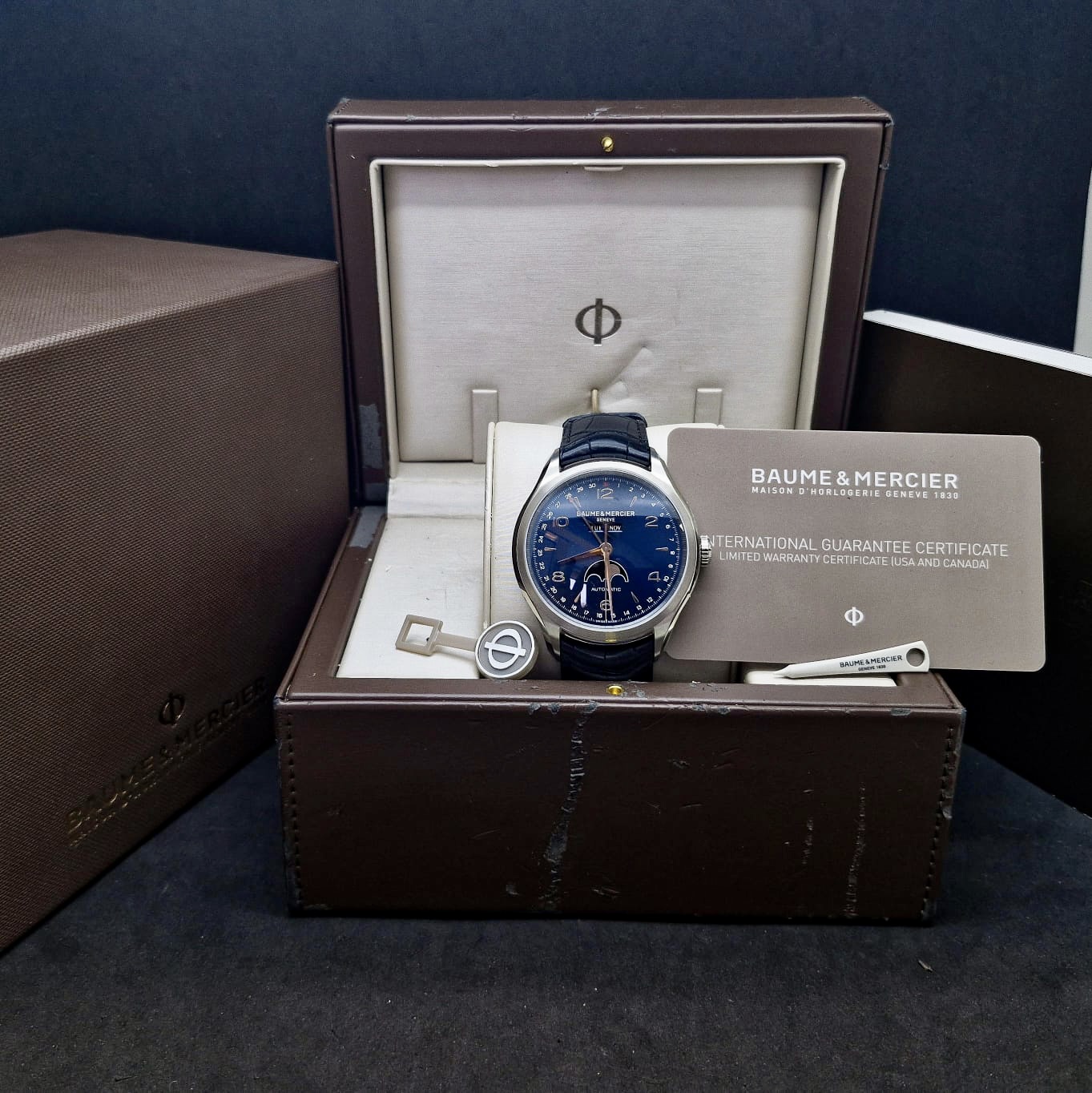 BAUME & MERCIER CLIFTON TRIPLE DATE MOONPHASE